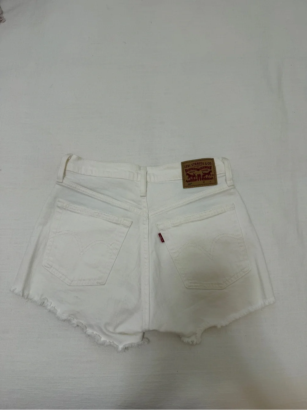 Levi's White Distressed Denim Cutoff Shorts